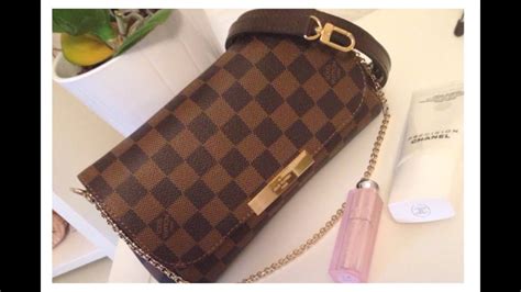 louis vuitton favorite pm vs eva clutch|Louis Vuitton eva clutch monogram.